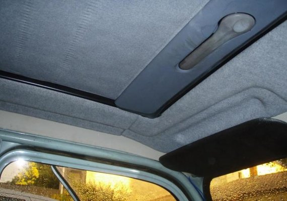 New sunroof with original and new trims in place.jpg