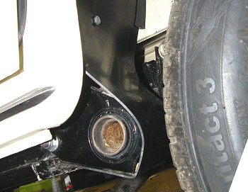 Front of rear wheelarch liner covering suspension mounting