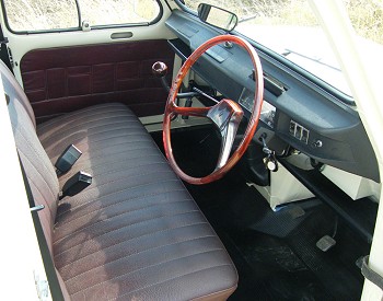 Bench front seat and translucent steering wheel