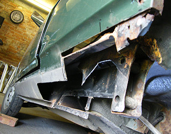 The remains of a Renault 5  having had half the rear suspension mounting cut out.
