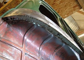 Lower edge of repair panel tack welded