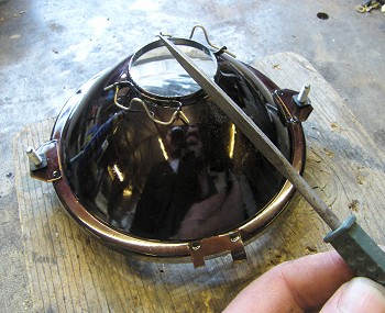 Needle file used to modify headlamp